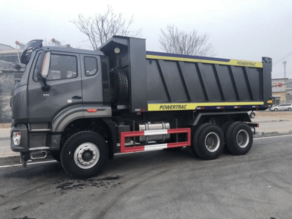 A black-colored dump truck